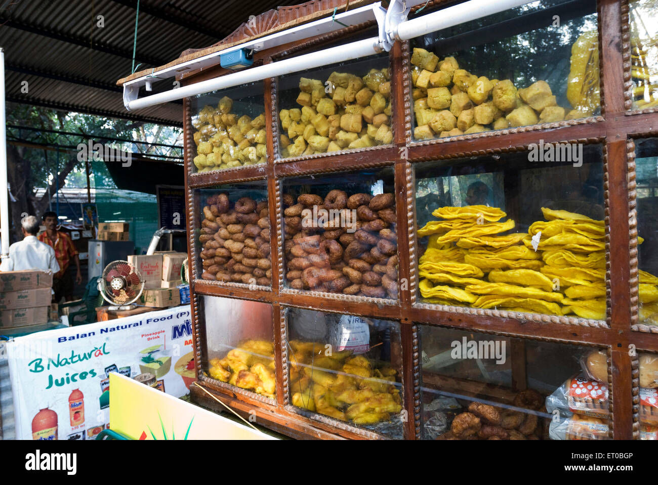 snack display counter in roadside dhaba restaurant, Kerala, India, asia Stock Photo