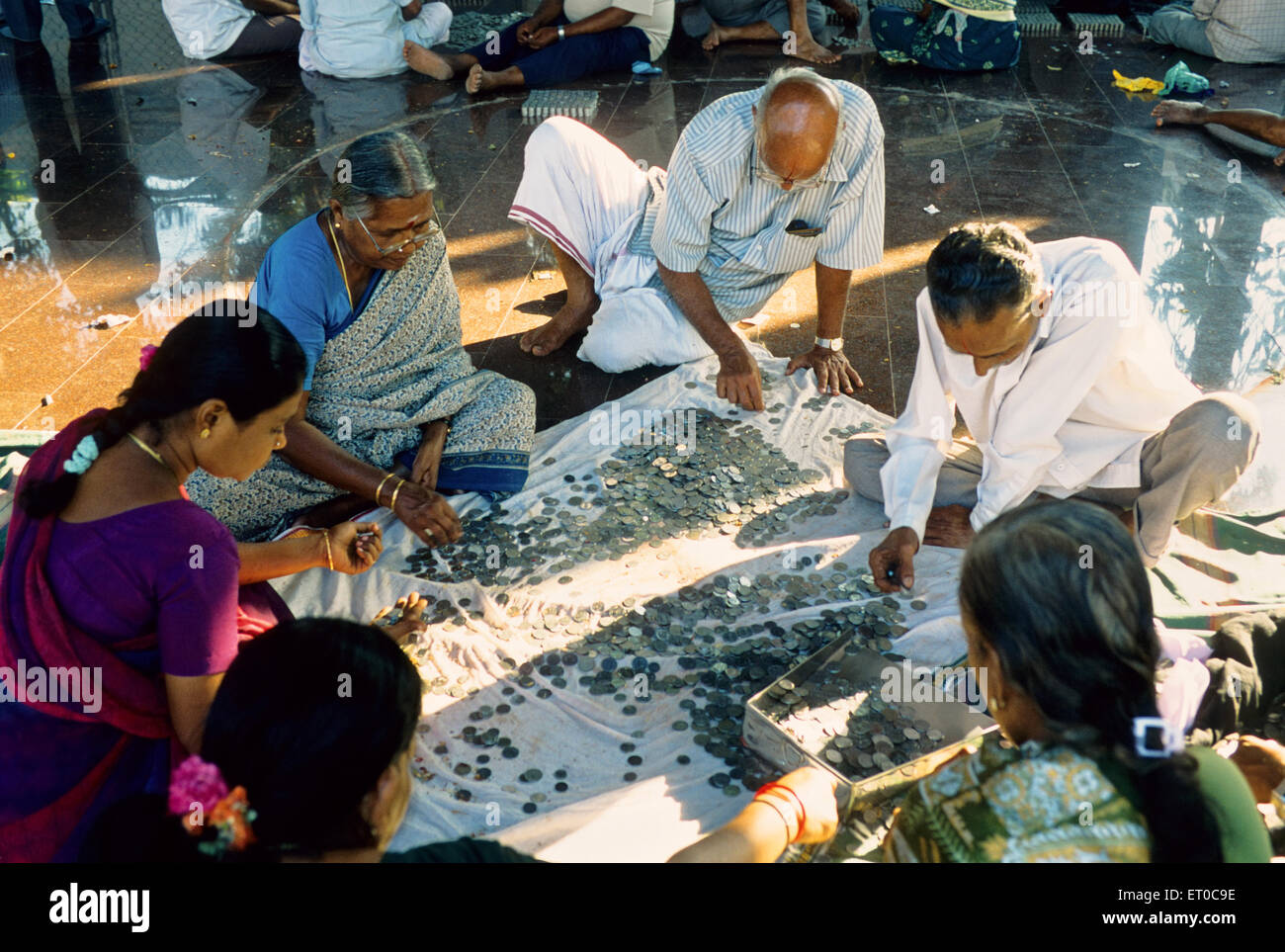 Counting donation hundi coins, Kapaleeshwarar Temple, Mylapore, Madras, Chennai, Tamil Nadu, India, Asia Stock Photo