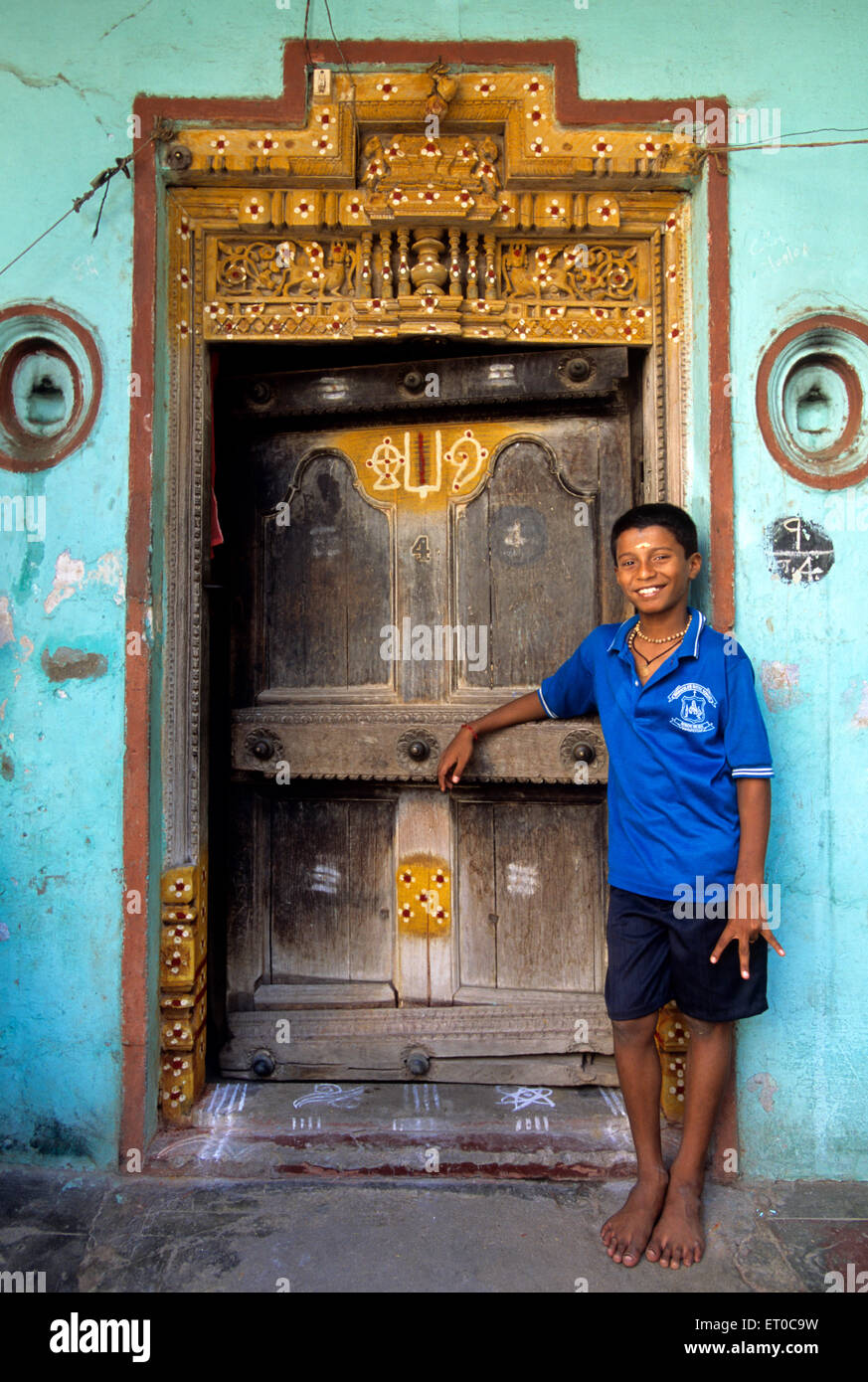 Boy at old house in Madras Chennai ; Tamil Nadu ; India NO MR Stock Photo