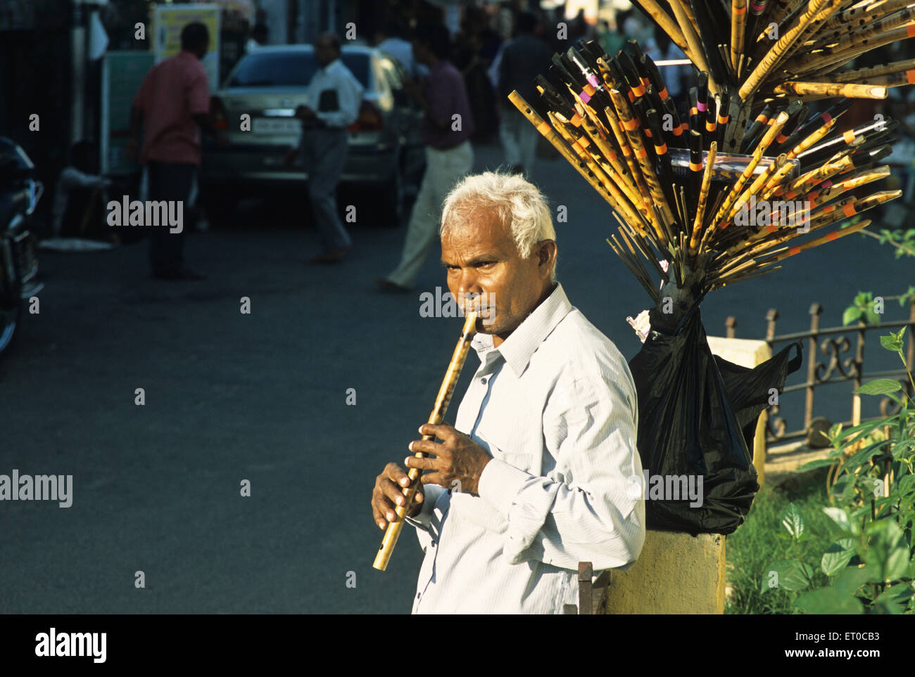 Flute vendor at Mylapore ; Madras Chennai ; Tamil Nadu ; India NO MR