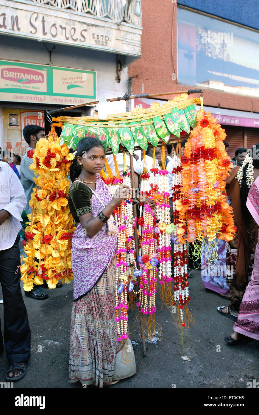 woman artificial garlands hawker , Mylapore ; Madras , Chennai ; Tamil Nadu ; India , asia Stock Photo