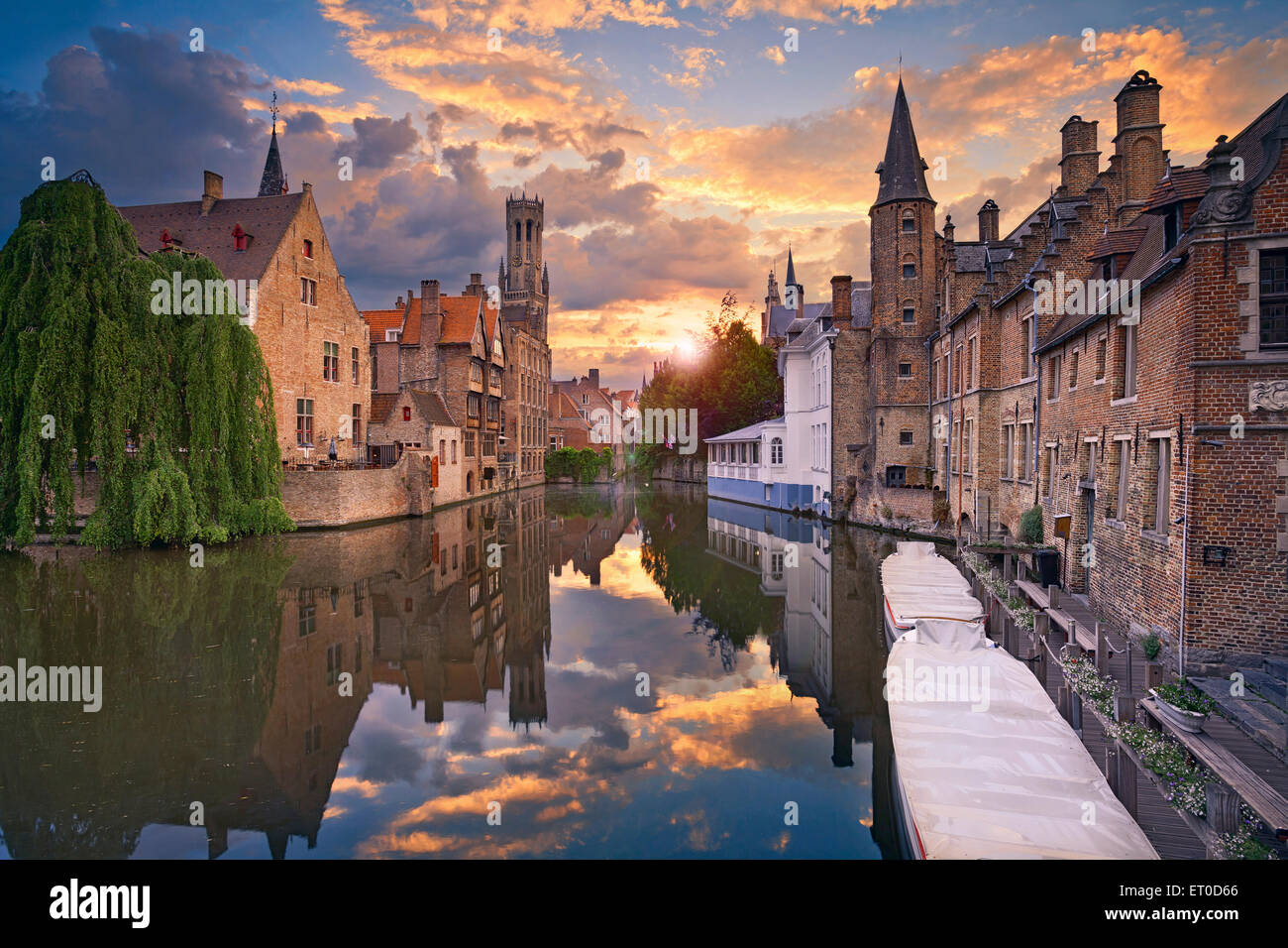 Bruges. Image of famous most photographed location in Bruges, Belgium during dramatic sunset. Stock Photo