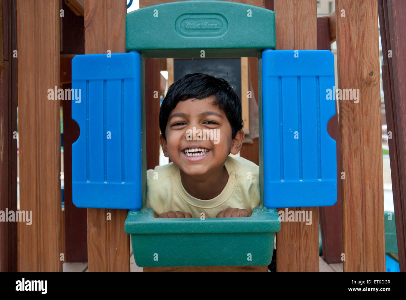 Boy playing MR#777I Stock Photo - Alamy