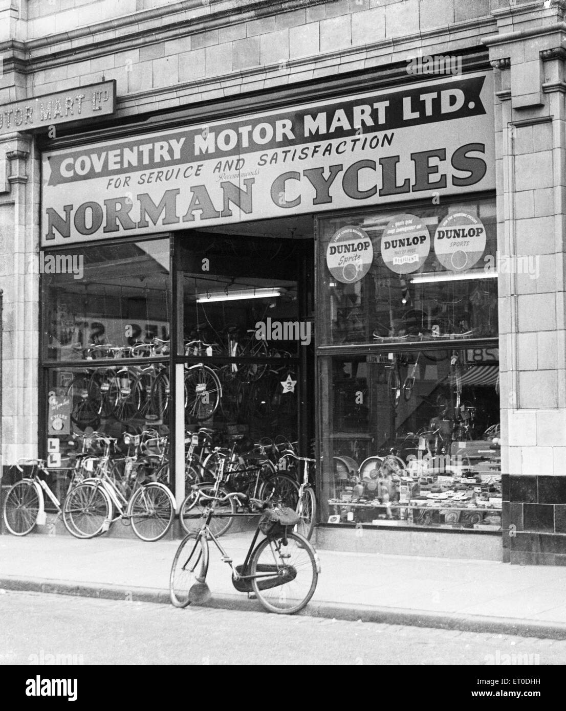 Coventry Motor Mart bicycle shop on White Friars Street Coventry circa 1957 Stock Photo