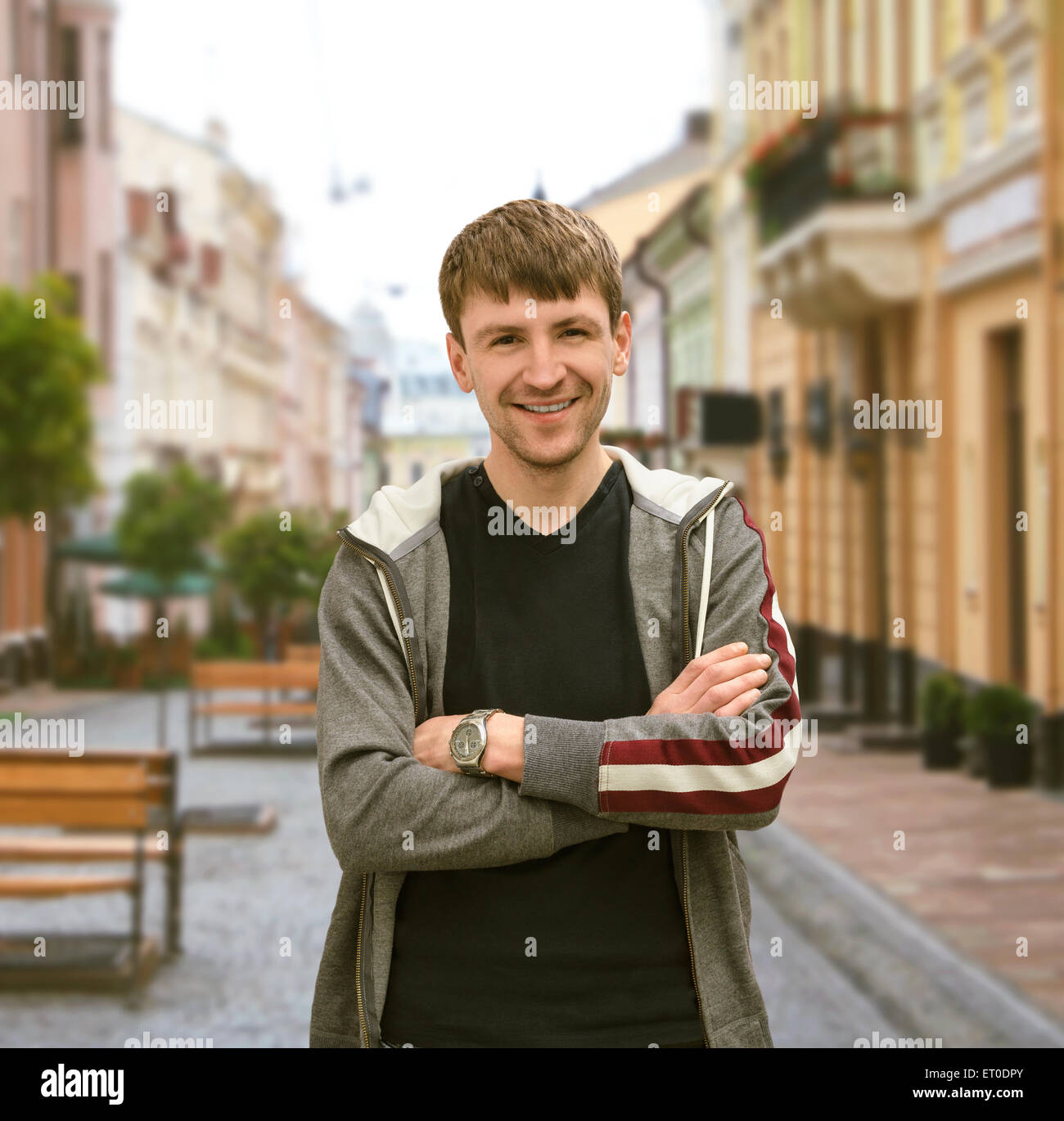portrait of a trendy young man in the city Stock Photo - Alamy