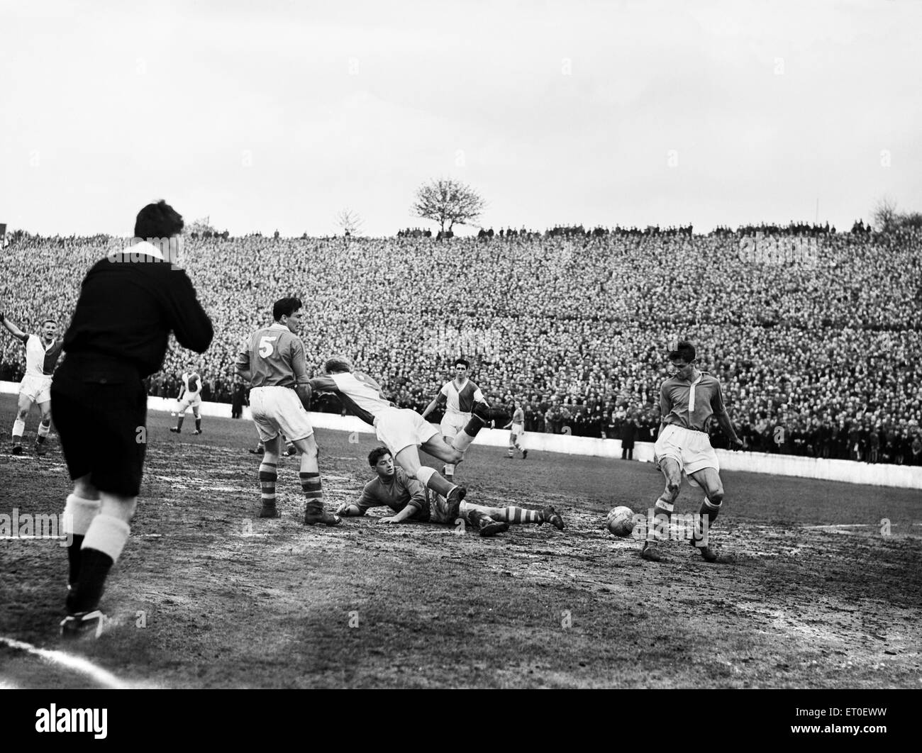 English League Division Two match at The Valley. Charlton Athletic 3 v Blackburn Rovers 4. Action during the match in which Blackburn were promoted to the first division. As the '57-58 season drew to a dramatic finale Charlton were on the brink of an instant return to the first division. The battle for promotion had see-sawed between them West Ham United Liverpool Fulham and Blackburn Rovers. Charlton went into the last game of the season in blistering form after a 5-1 away demolition of Rotherham a 4-1 home win over Notts County and a 4-1 stuffing of Ipswich Town at Portman Road. A point Stock Photo