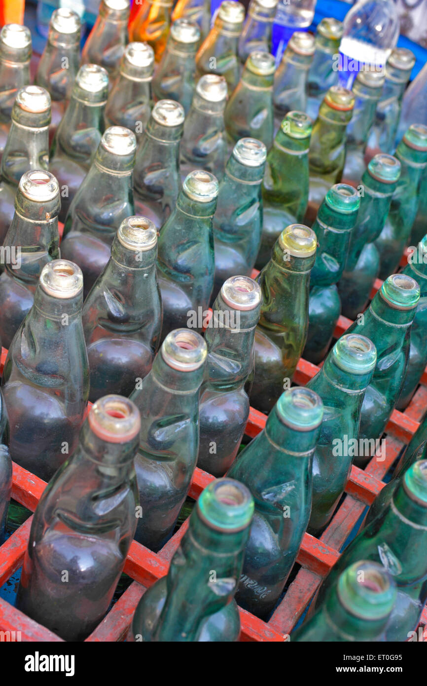 Empty glass soda water bottles in crate ,  Anand , Charotar , Gujarat , India , Asia Stock Photo