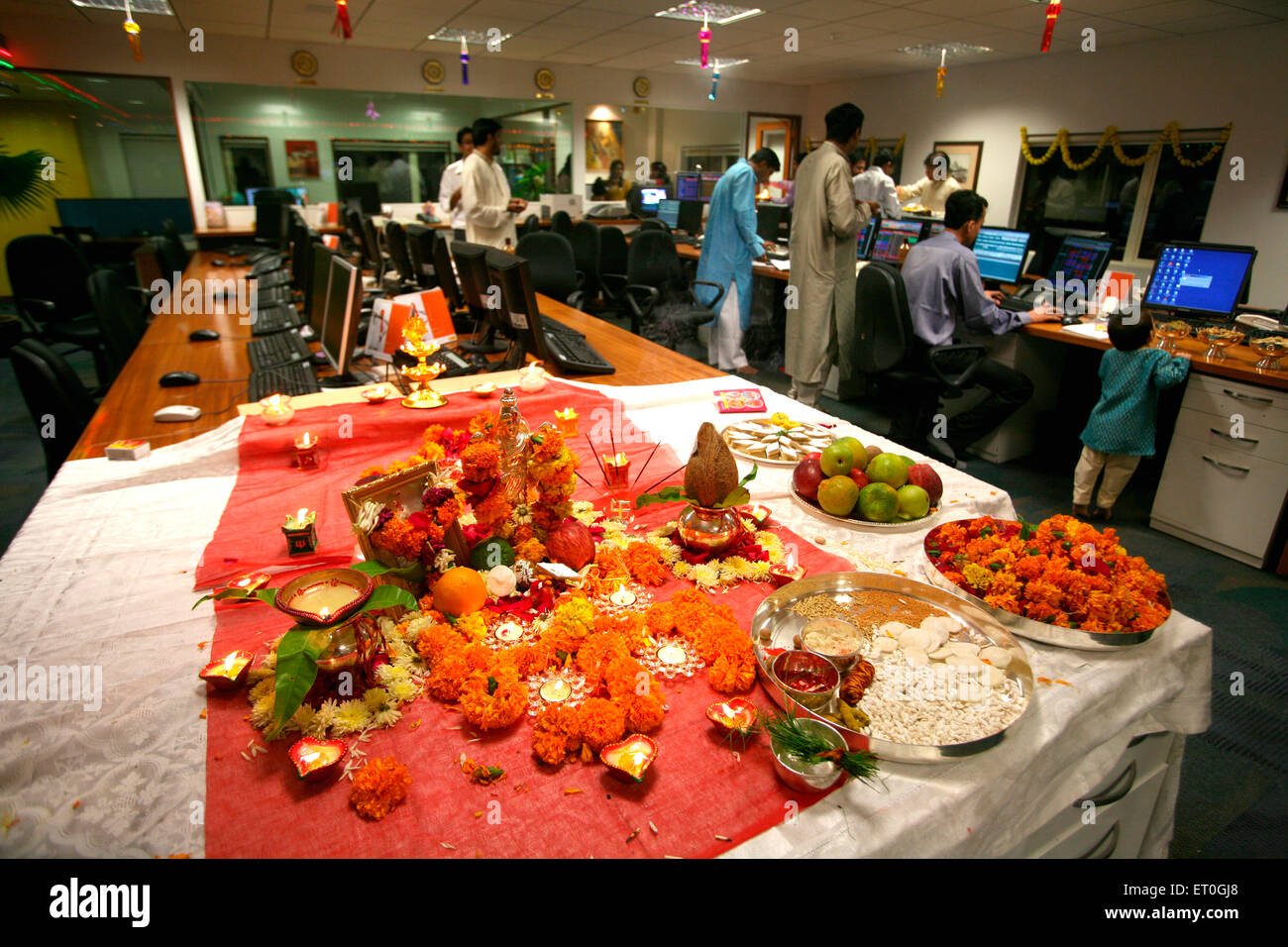 Lakshmi puja performed in brokers office in Bombay now Mumbai ; Maharashtra ; India Stock Photo