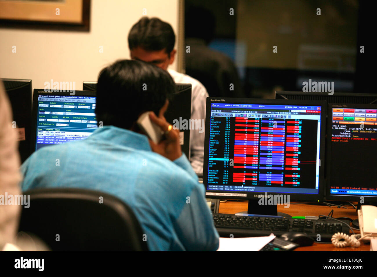 Stock brokers doing muhurat trading marking beginning of new trading year after Lakshmi puja pooja performed by stock broker Bombay Mumbai India Stock Photo