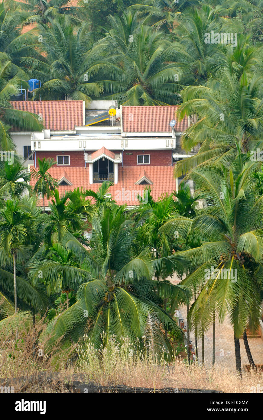 Bungalow with solar panels on terrace , Karkal , Udupi , South Kanara , Karnataka , India , Asia Stock Photo