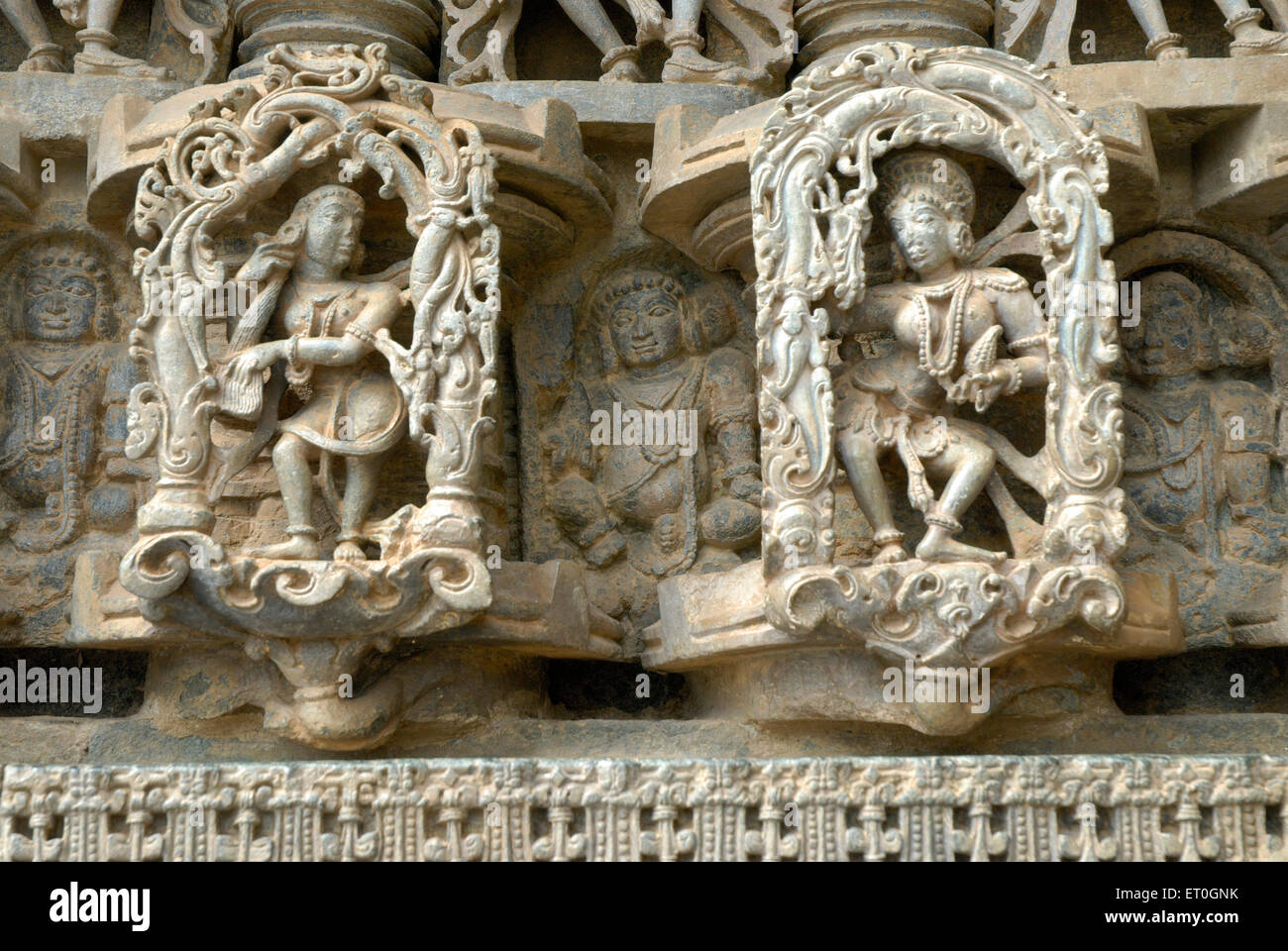 Female figures carved in stone on wall of Channakesava Vishnu temple ; Belur ; district Hassan ; Karnataka ; India Stock Photo
