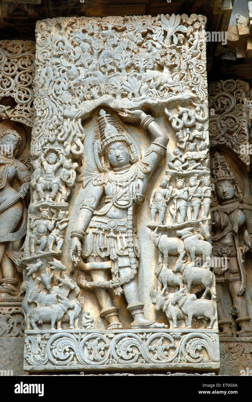 Statue of lord Krishna lifting govardhan mountain at Shiva temple