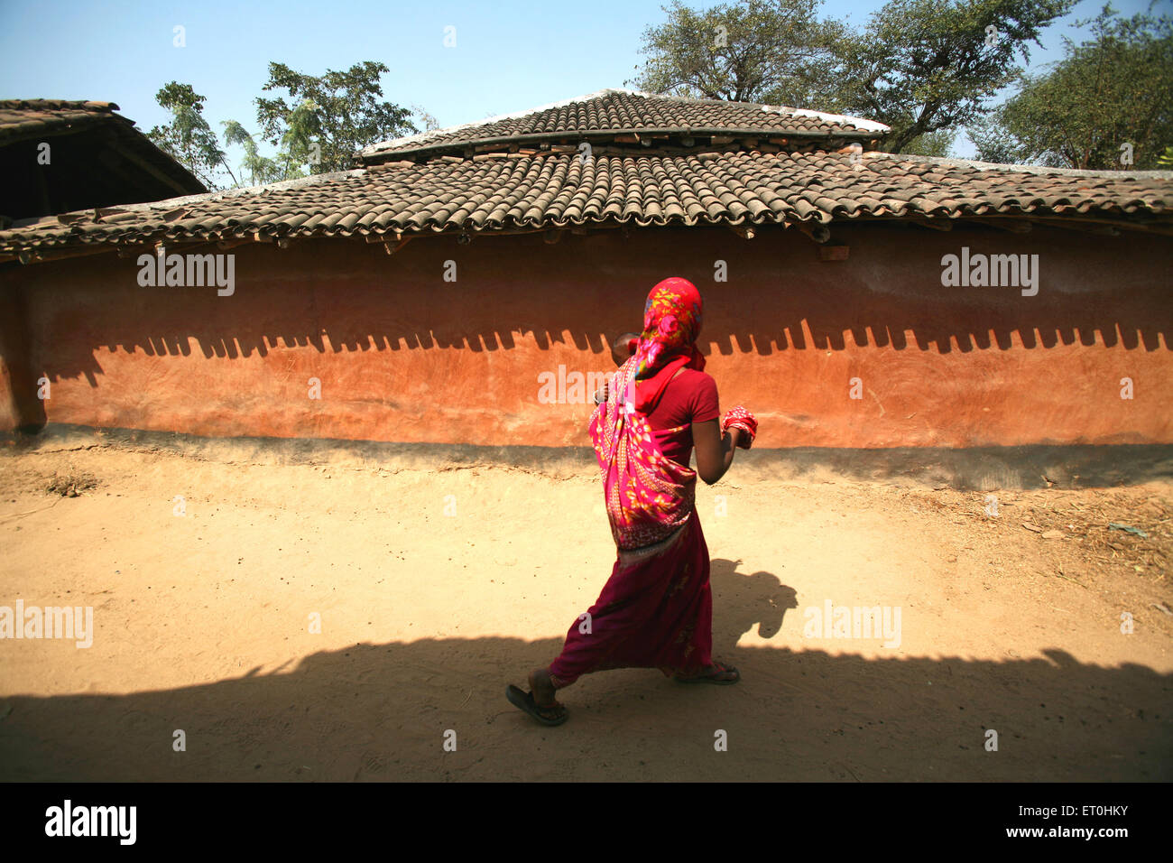 Indian rural woman walking village road, Ranchi, Jharkhand, India