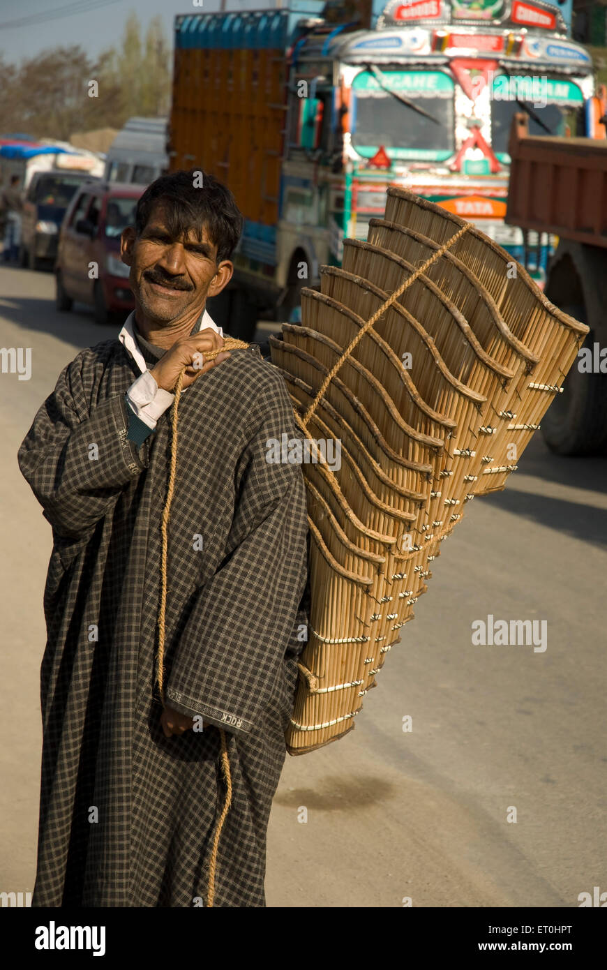 Man selling cane baskets Srinagar Jammu and Kashmir India Asia MR721