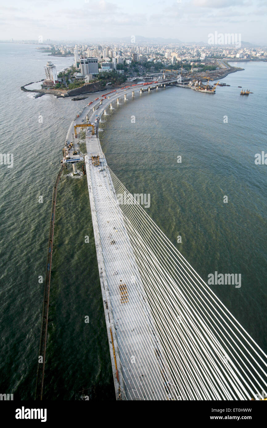 View of under construction Bandra Worli sea link is 8 lane twin carriageway cable stayed bridge ; Bombay Mumbai Stock Photo