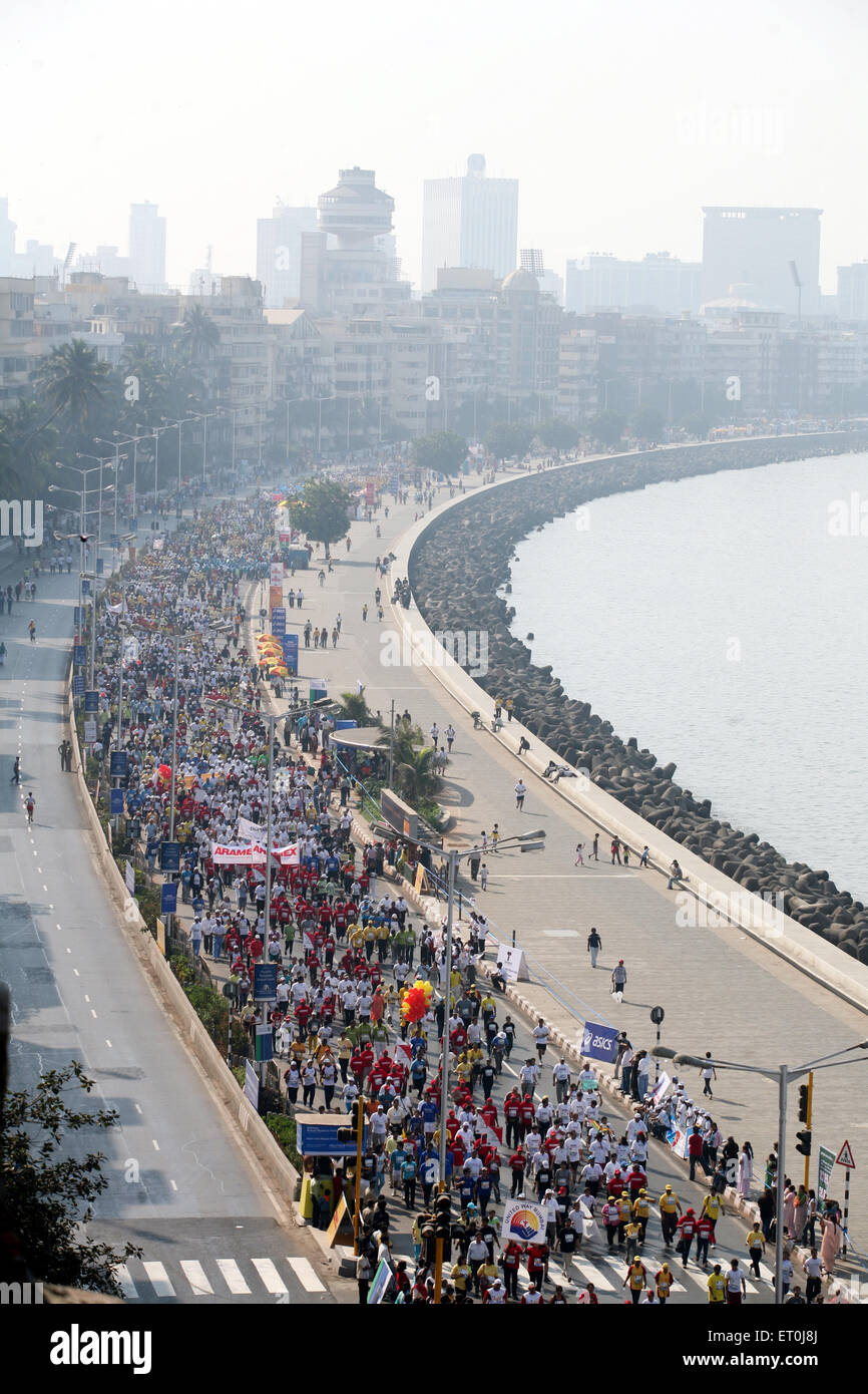 Participants running by the Queen's Necklace in Nariman Point ; Mumbai