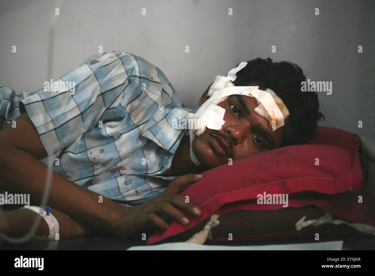 Bomb blast victim being treated at the nearby hospital of Malegaon ; Maharashtra ; India 29th September 2008 NO MR Stock Photo