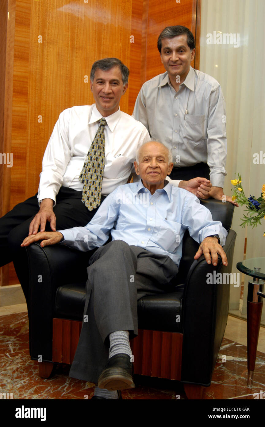 Dr. L. H. Hiranandani Chairman with sons Niranjan and Surendra Hiranandani Managing director in office Powai Bombay Mumbai Maharashtra India Stock Photo