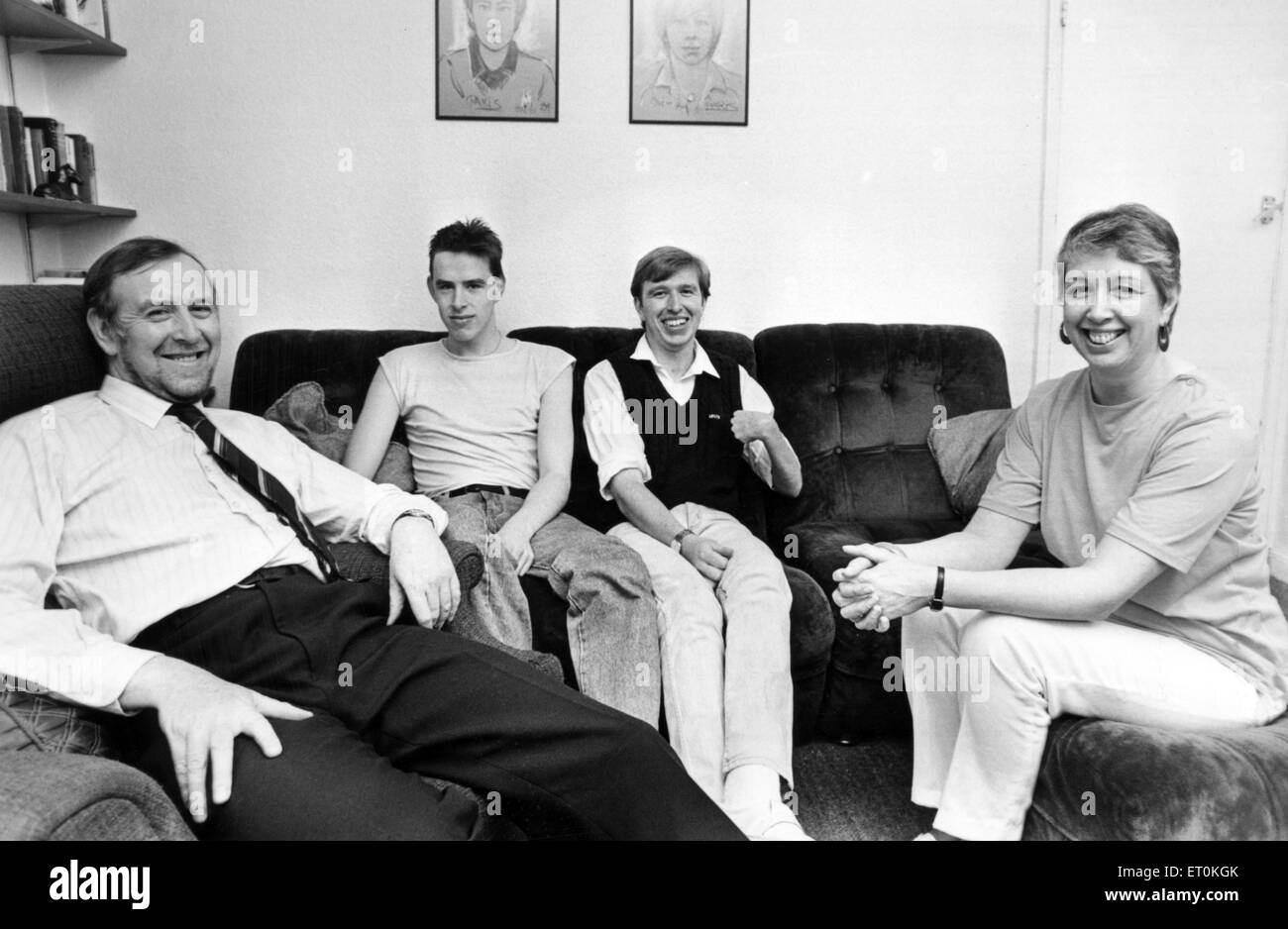 Dave Yewlett, who was in a near-fatal road accident five years ago, and went on to win sporting medals despite being wheelchair-bound. Pictured here is the Yewlett family at their home in Pen Y Dre, Rhiwbina, Cardiff. From left, John, sons Philip (19) David (21) and his wife Helena. 28th April 1987. Stock Photo