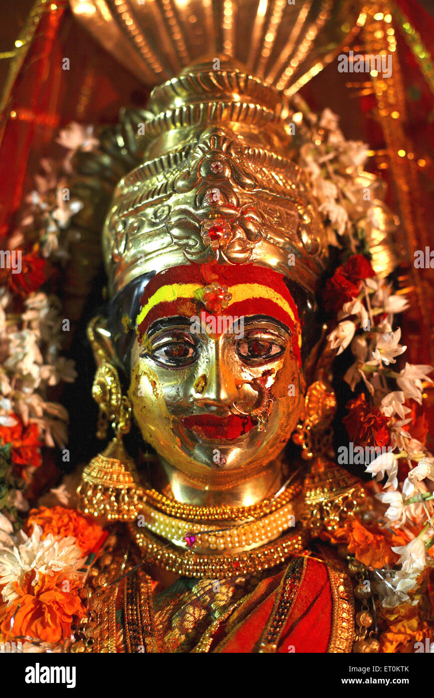Fully decorated bronze statue of goddess Yellama turmeric ; kumkum ; wedding eunuchs Bewa Purnima at Ghatkopar ; Mumbai Stock Photo