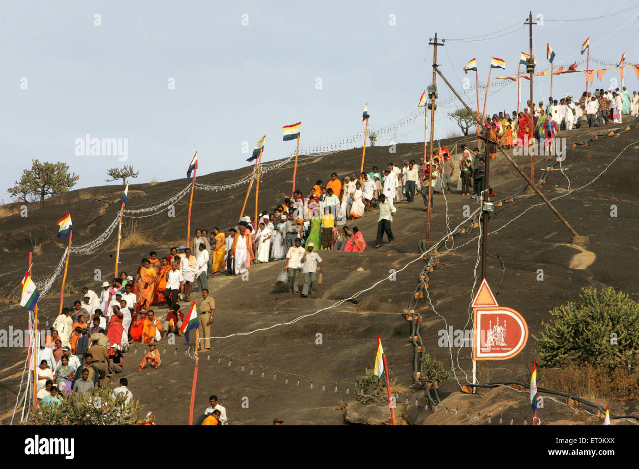 Queues of people coming down from hills of Shravanabelagola  attending Mahamasthakabhisheka Jain festival ; Hassan Karnataka Stock Photo