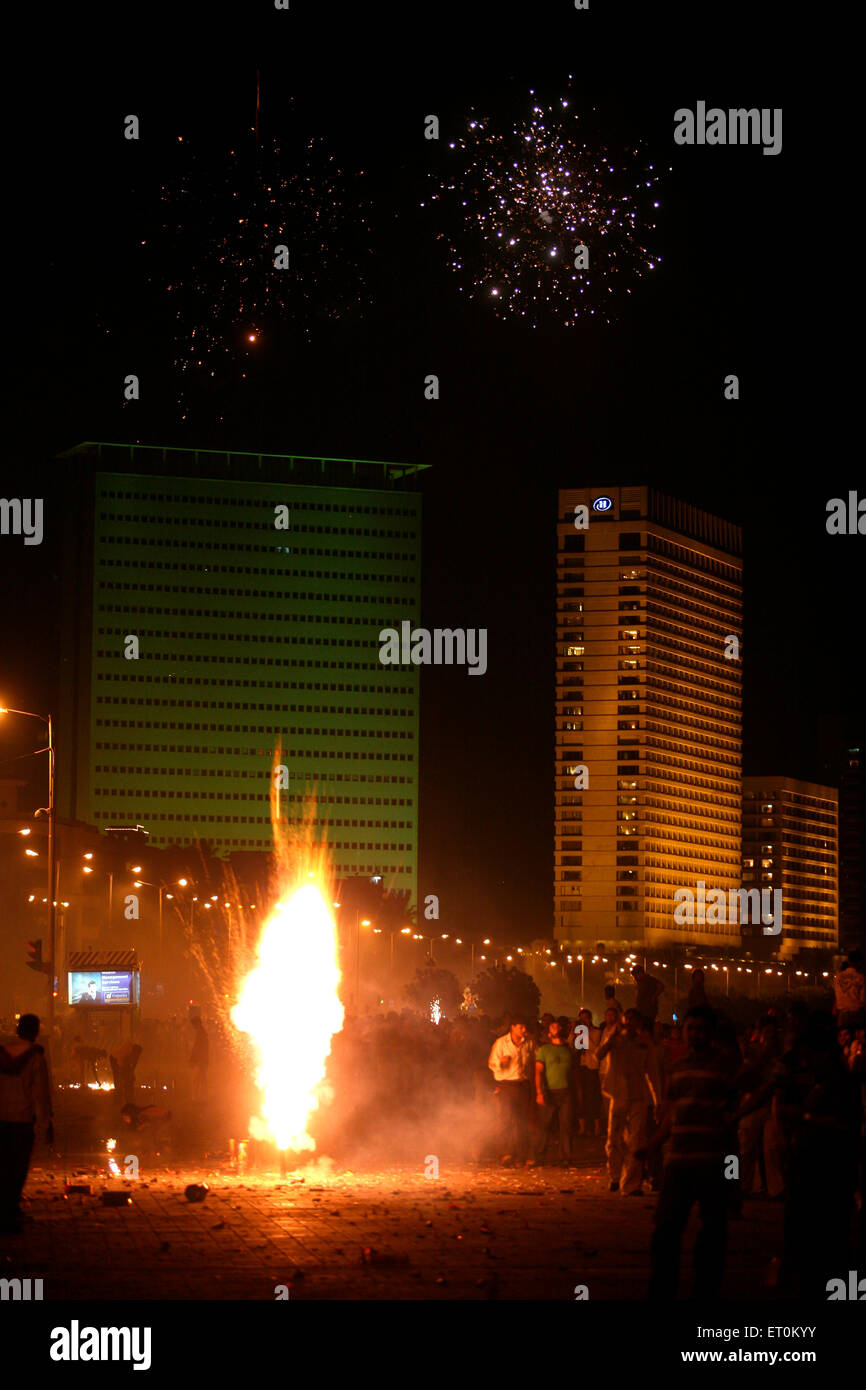 Diwali Deepawali Celebrations by bursting fire crackers at Marine Lines in Bombay Mumbai ; Maharashtra ; India Stock Photo