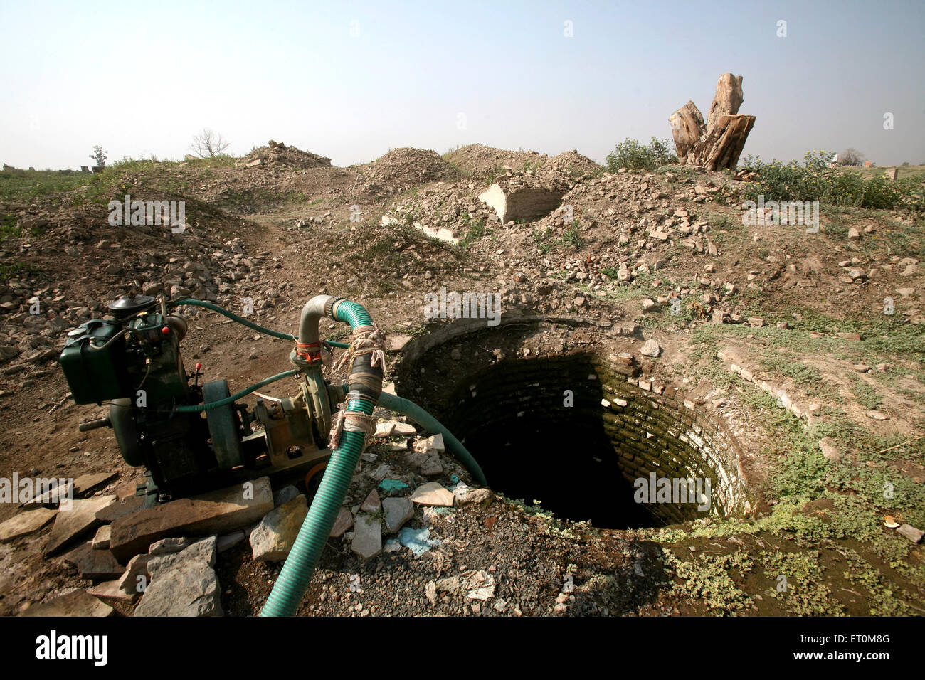 Water pump to pull out water for farming from deep well is kept in fields of Bhopal ;  Madhya Pradesh ; India Stock Photo
