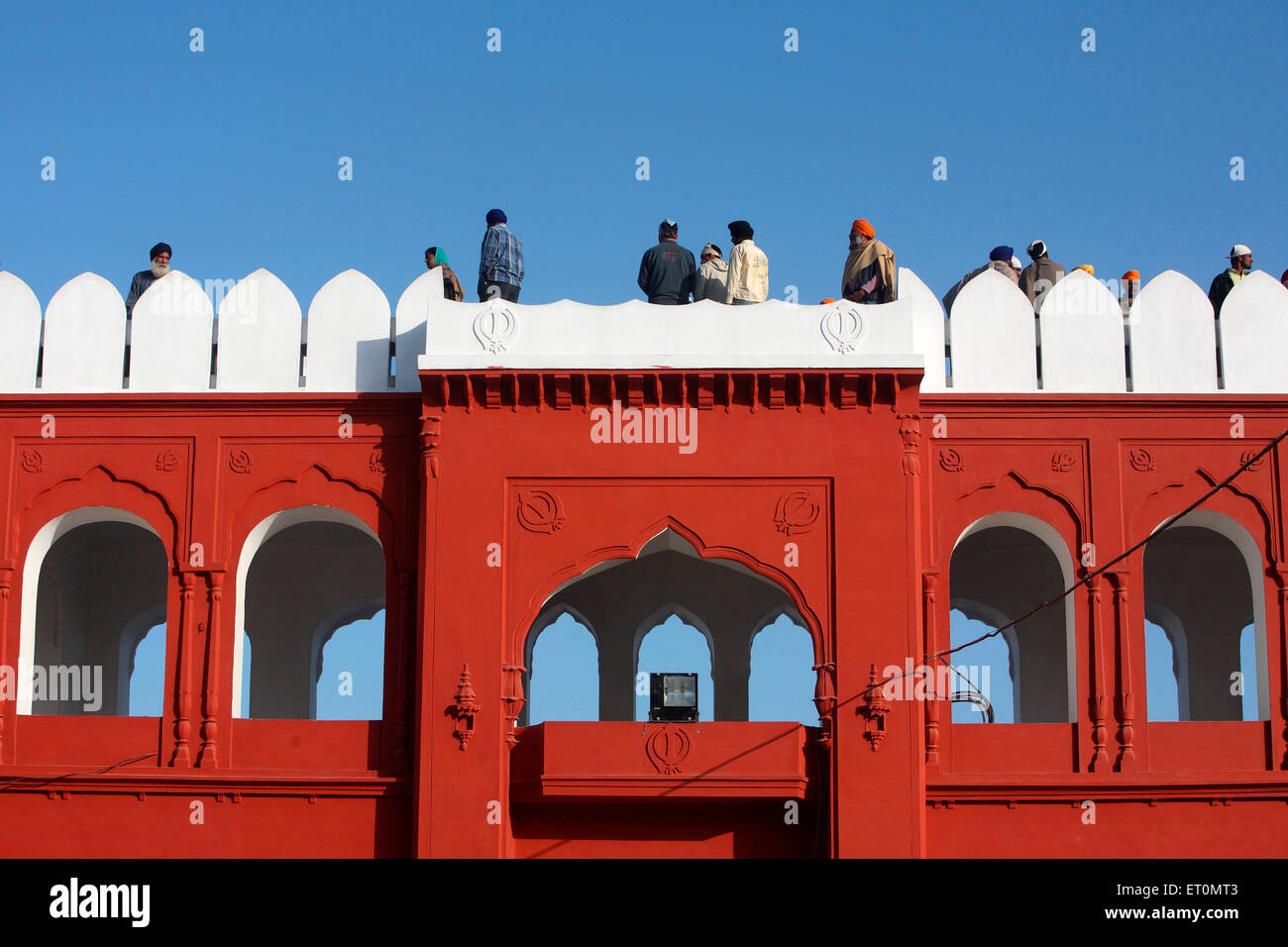 Devotees on top of  Anandgarh forts during the celebration of Hola Mohalla at Anandpur Sahib Rupnagar district ;  Punjab ; India Stock Photo