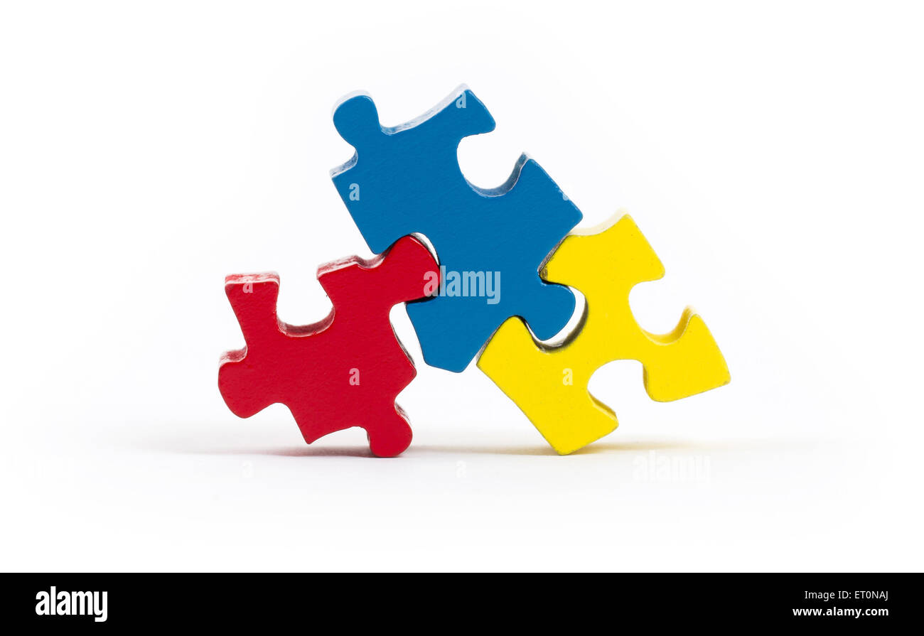 Jigsaw puzzle pieces isolated on a white background Stock Photo
