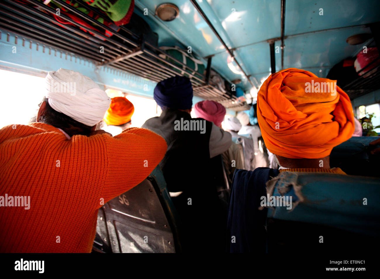 People sitting inside bus in Punjab ; India Stock Photo