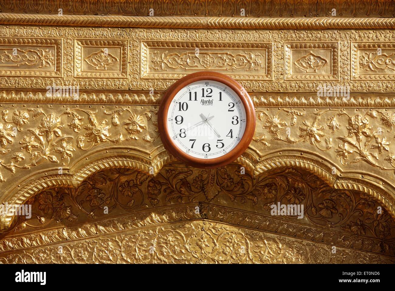Wall clock at Harmandir Sahib or Darbar Sahib Golden Temple in Amritsar