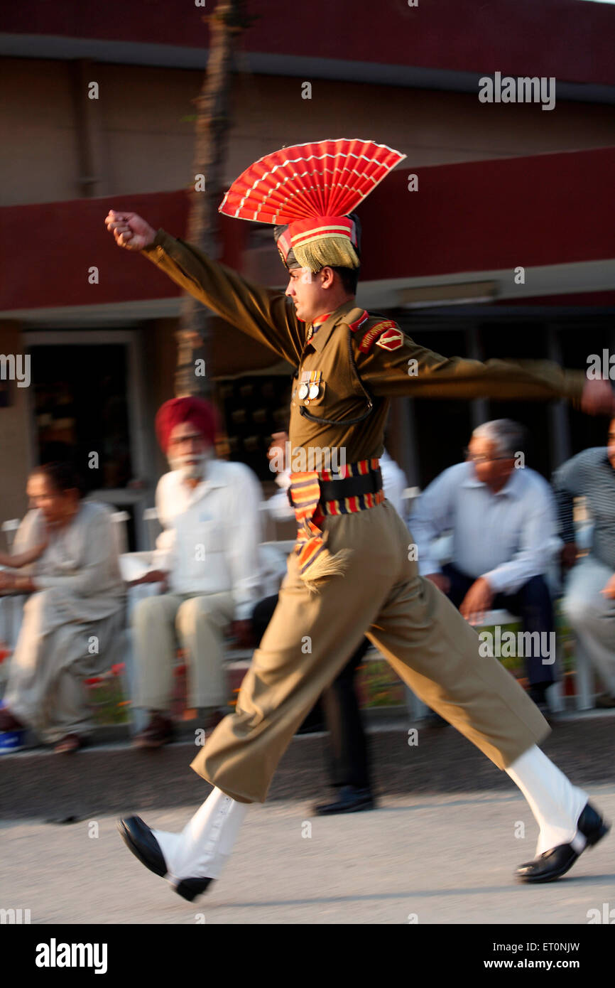 Indian border security force solider doing parade before start changing of guard ceremony at Wagah border Stock Photo
