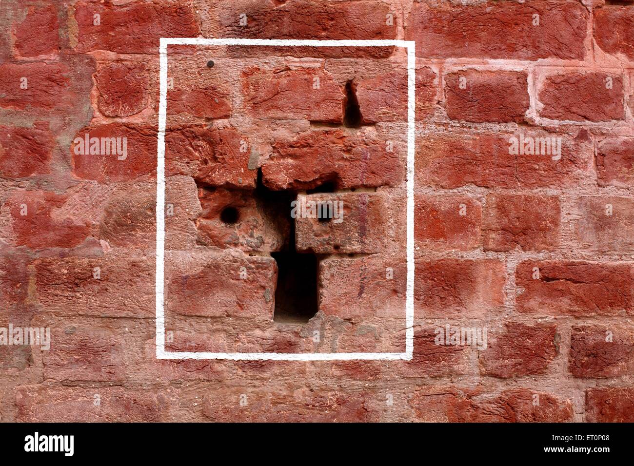 Bullet marks visible on preserved wall at Jalianwala Bagh ; Amritsar ; Punjab ; India Stock Photo