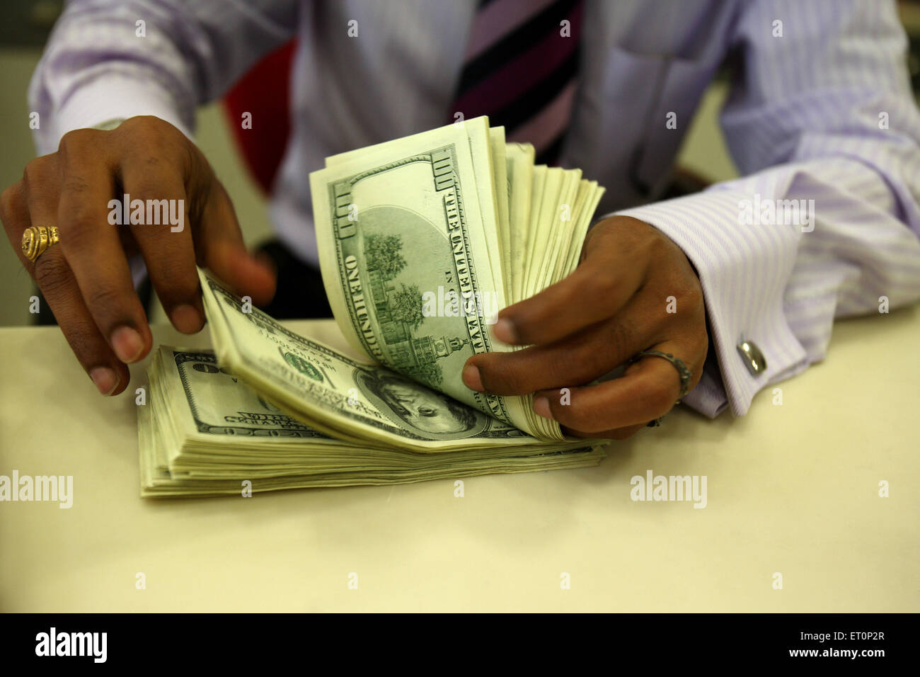 Bank handling counting US dollars Stock Photo