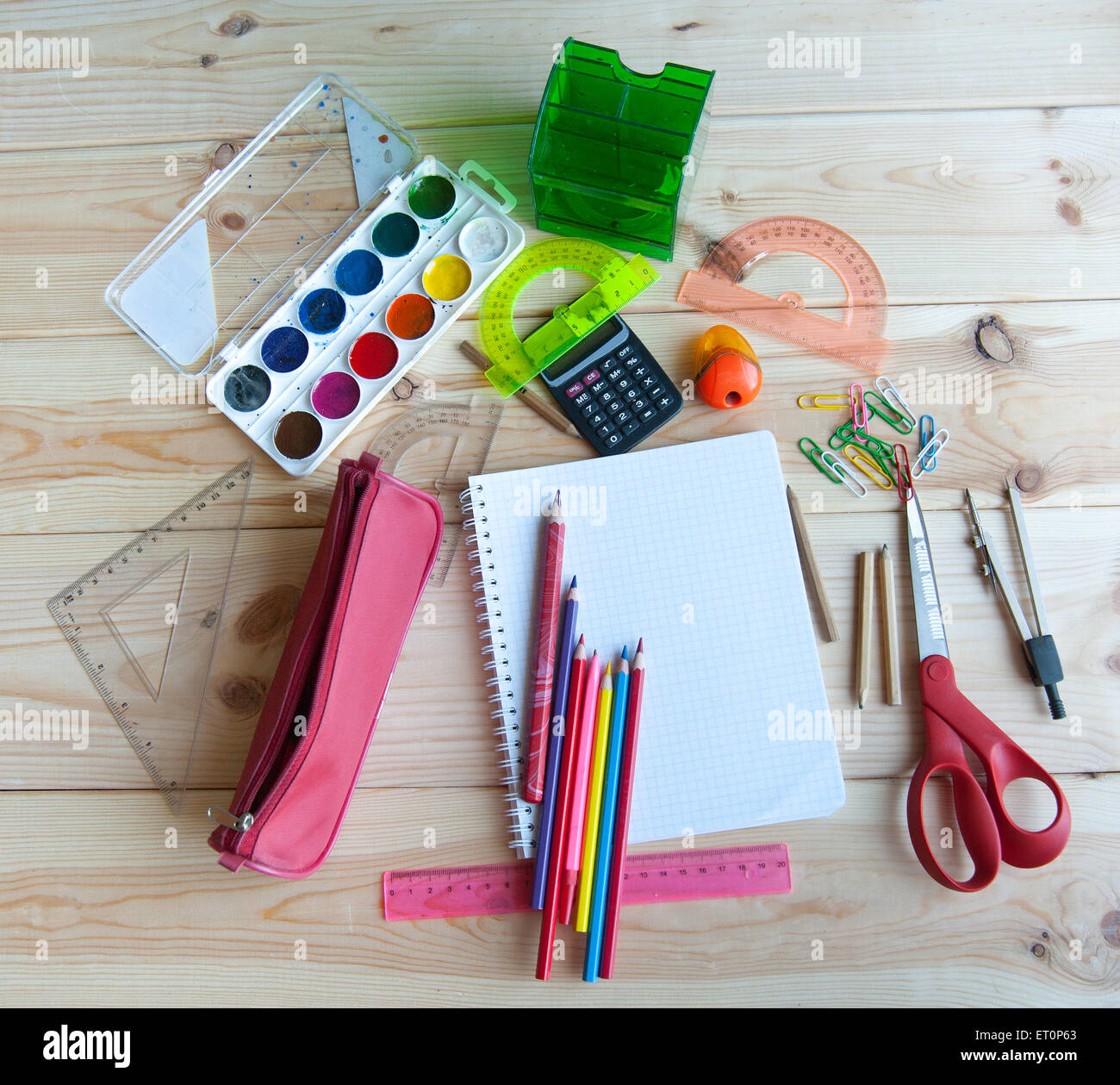 bunch of school supplies are on the table Stock Photo
