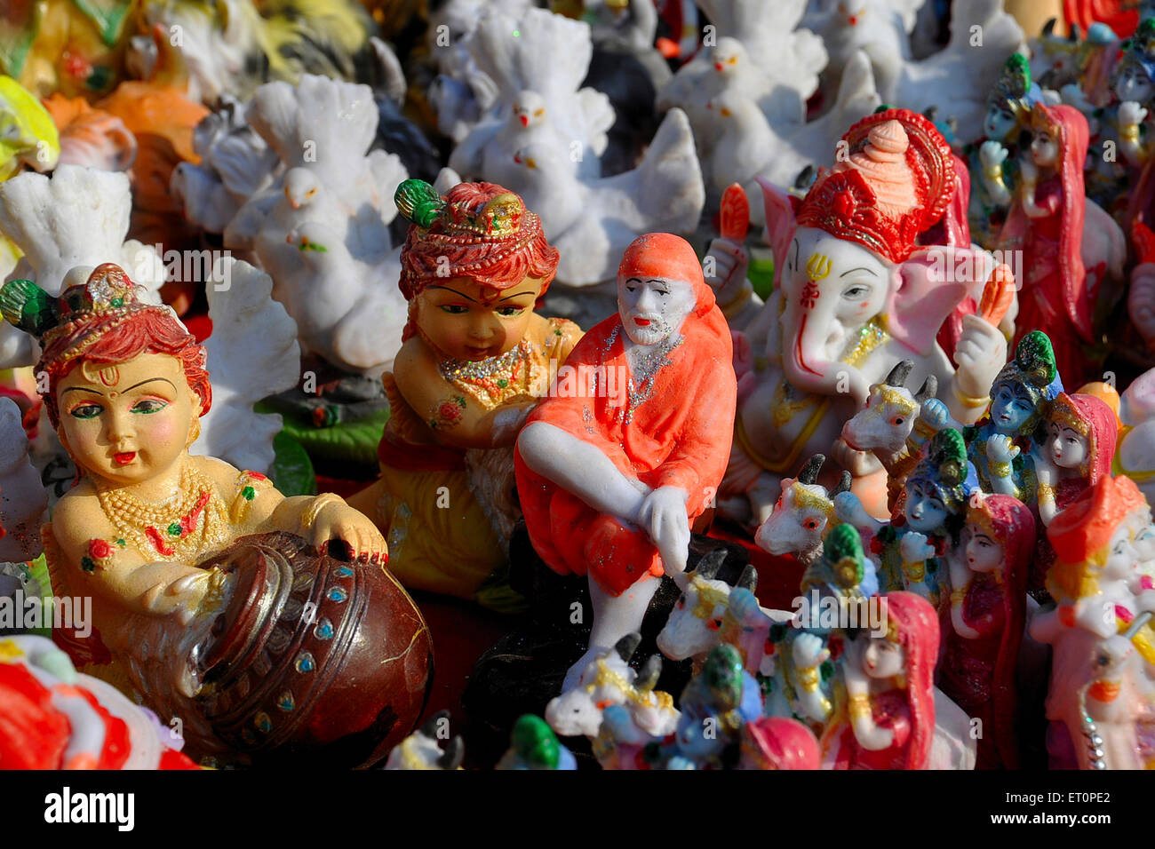 Krishna Ganesh Saibaba idols shop ; Pushkar fair ; Rajasthan ; India ; Asia Stock Photo