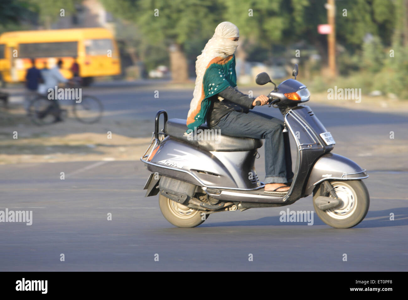 Woman on scooter india hires stock photography and images Alamy