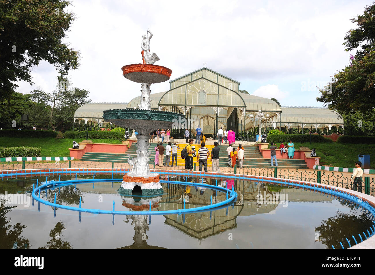 Mirror image of exhibition hall in botanical garden ; Bangalore ; Karnataka ; India Stock Photo