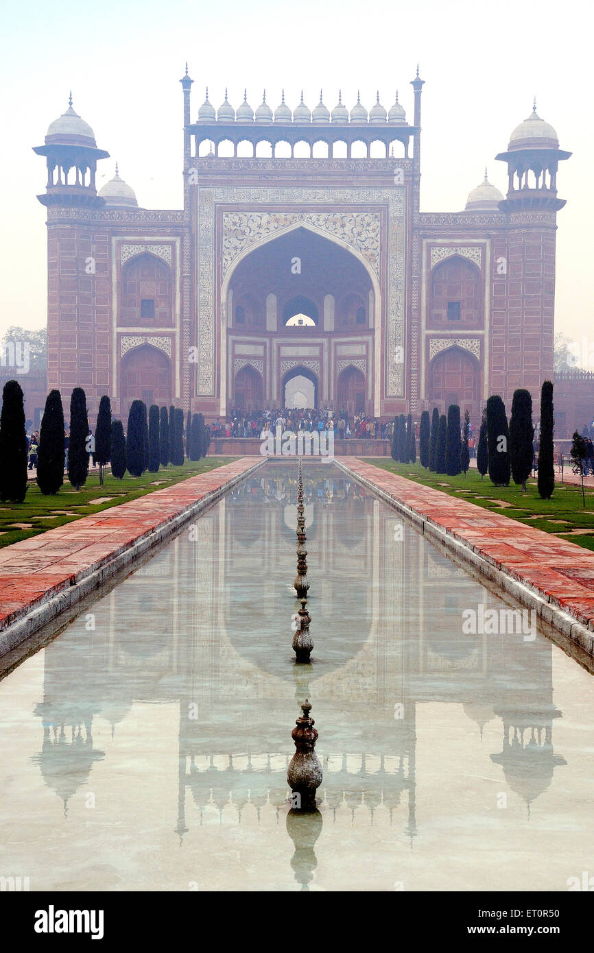 Main entrance gate, Taj Mahal, Islamic ivory white marble mausoleum, Agra, Uttar Pradesh, India, Indian monument Stock Photo