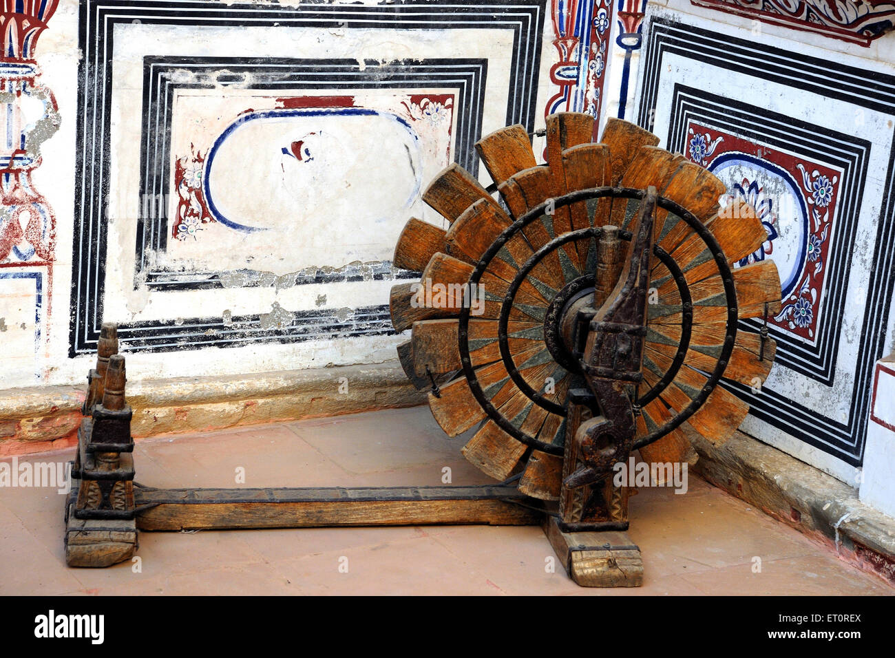 Wooden wheel charkha ; Rajasthan ; India Stock Photo