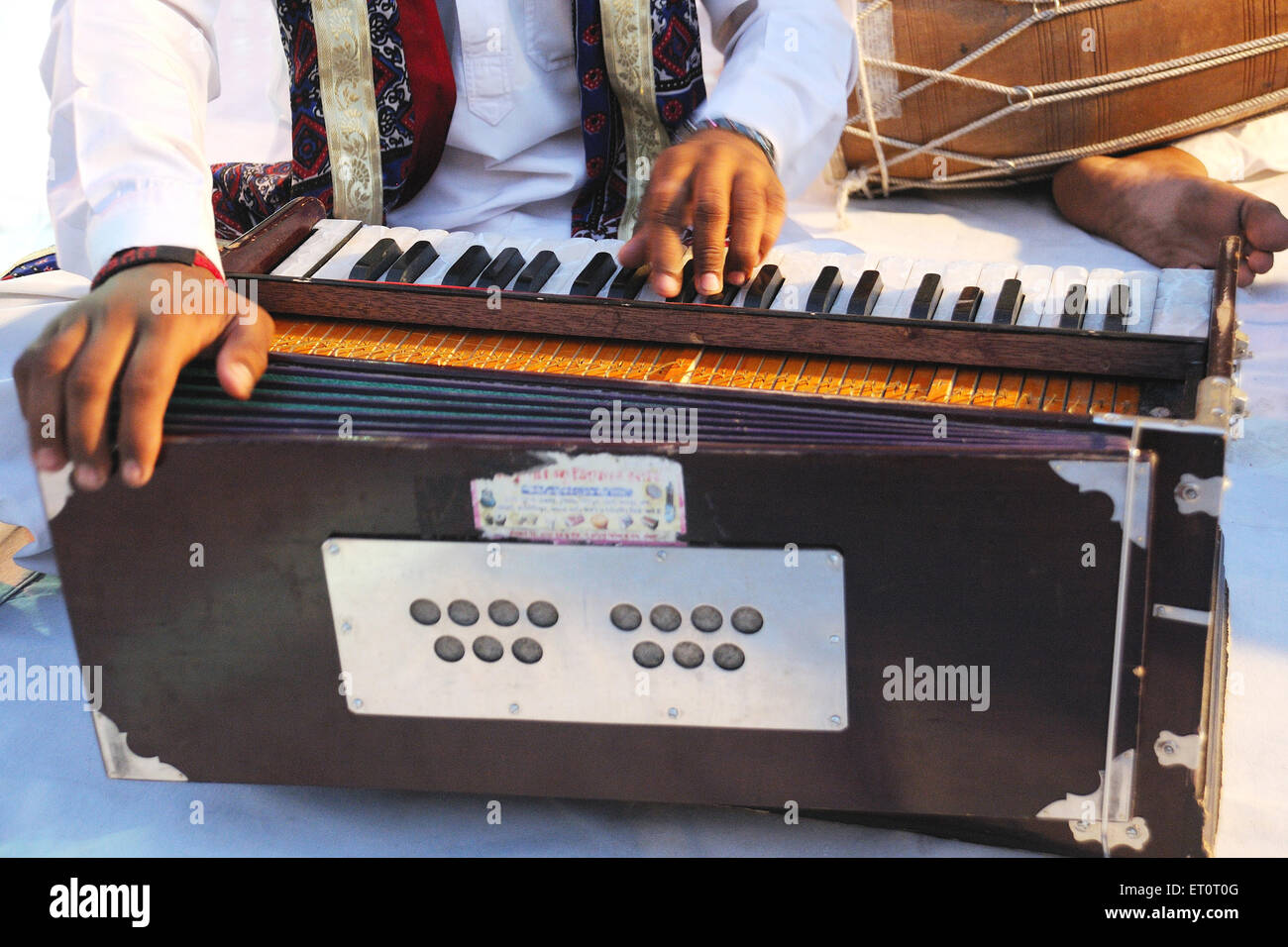 man playing harmonium, Ramdevra temple, Pokhran, Jaisalmer, Rajasthan, India Stock Photo