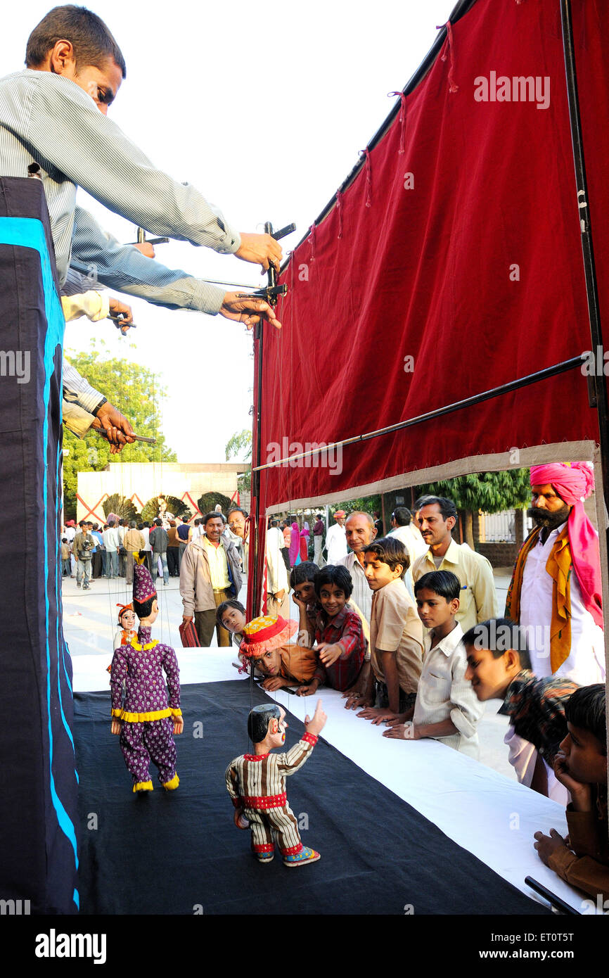 People watching puppet show , Jodhpur , Rajasthan , India , asia Stock Photo