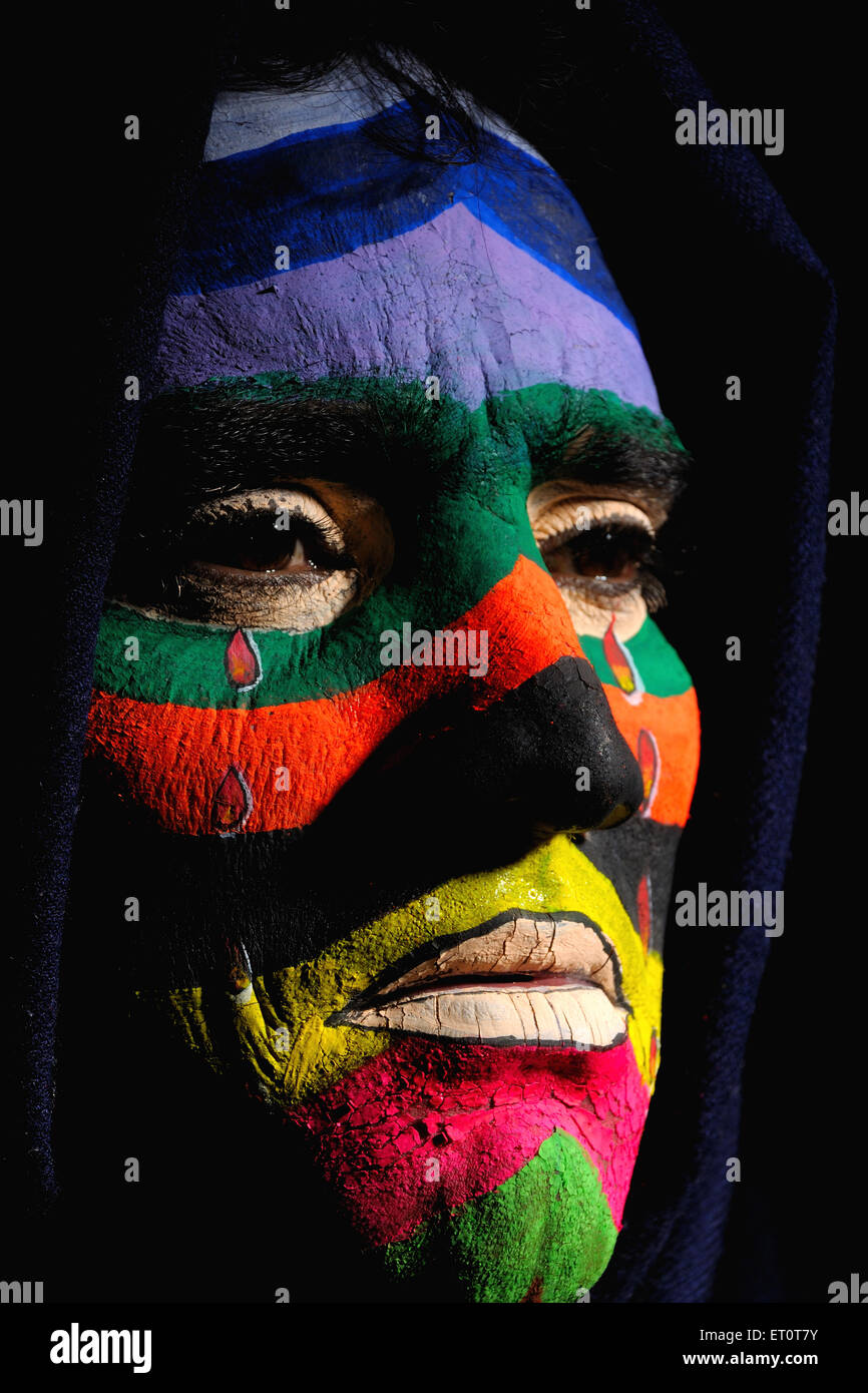 Painted face of man showing sad mood MR#769G Stock Photo