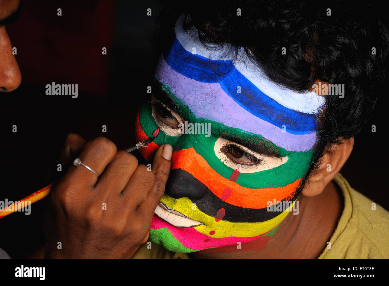 Painted face of man MR#769G Stock Photo