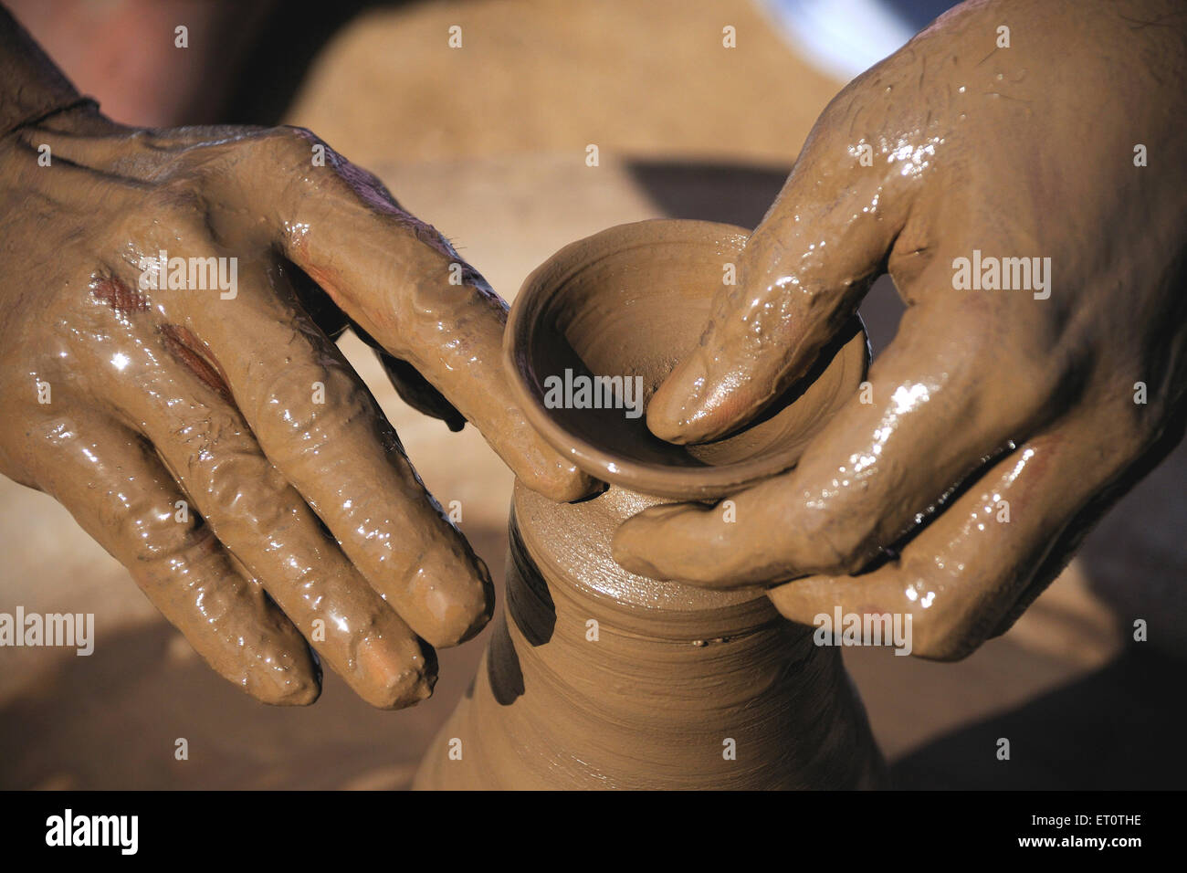 Potter making lamp ; Rajasthan ; India Stock Photo