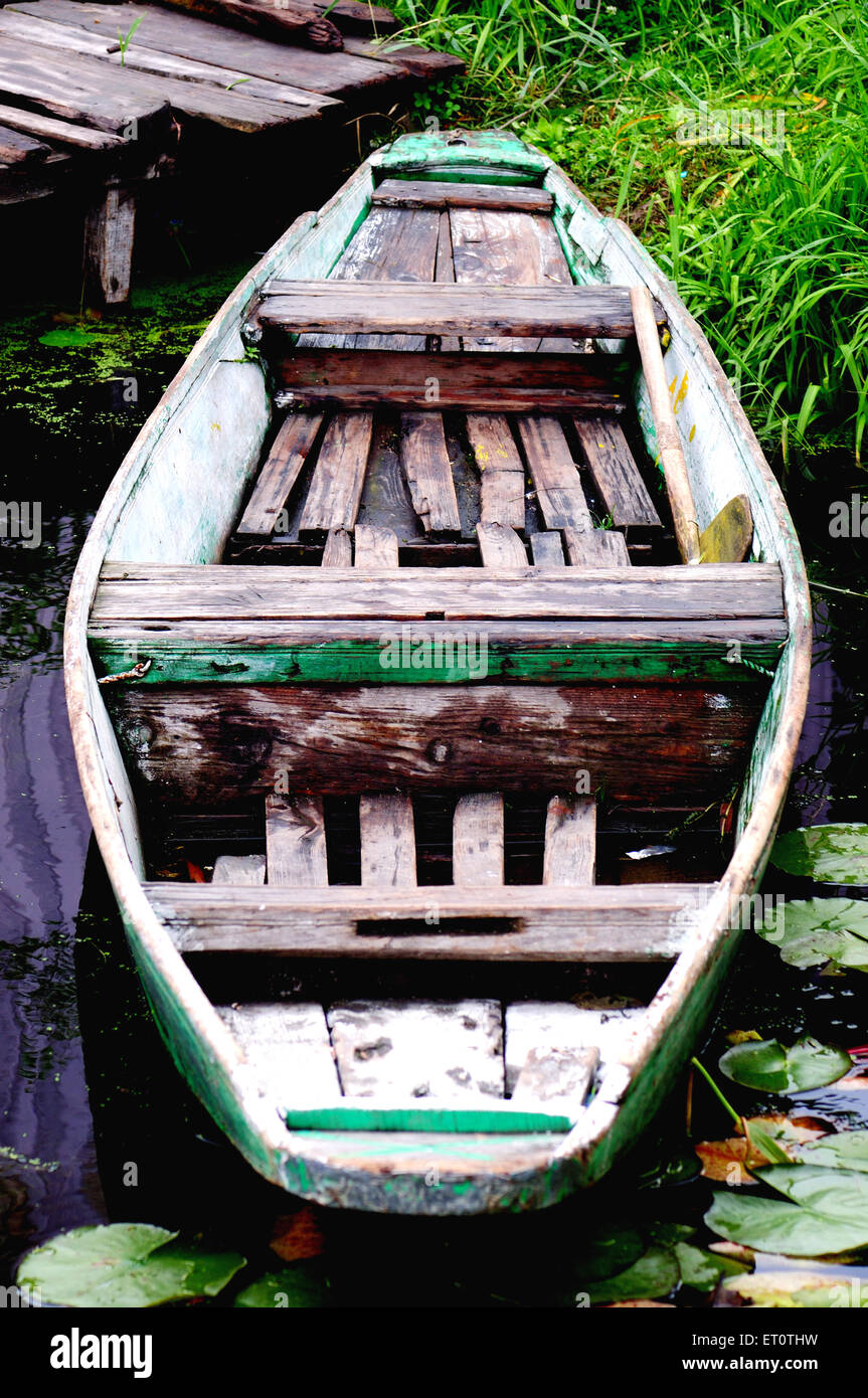 Empty canoe, Dal Lake, Srinagar, Jammu and Kashmir, India Stock Photo