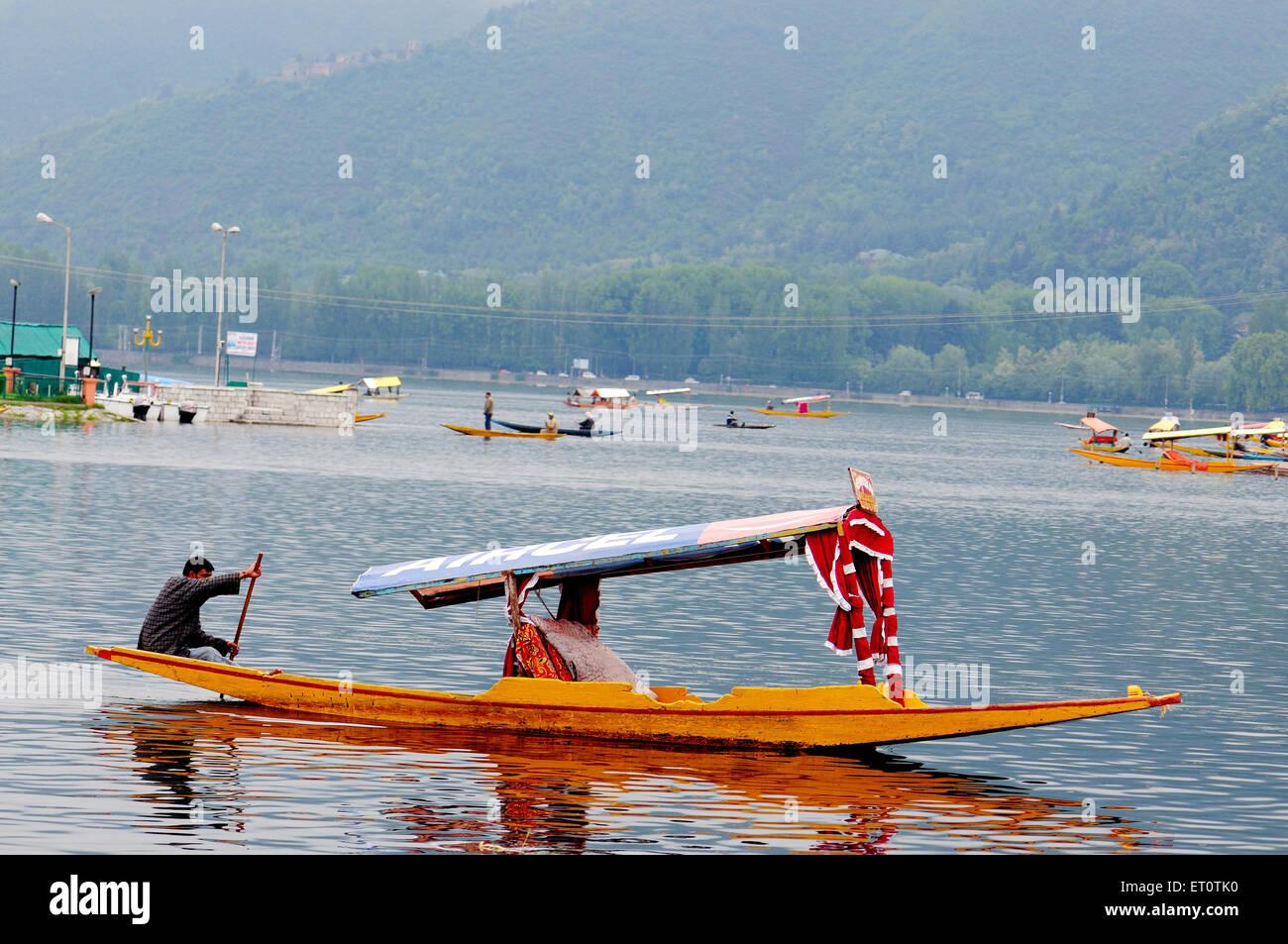 Canoe shikara in dal lake ; Srinagar ; Jammu and Kashmir ; India Stock Photo