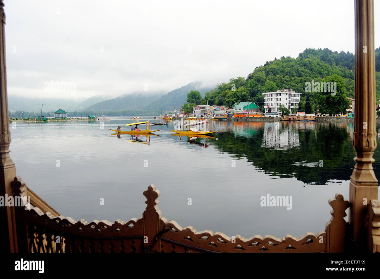 Canoe shikaras in dal lake ; Srinagar ; Jammu and Kashmir ; India Stock Photo