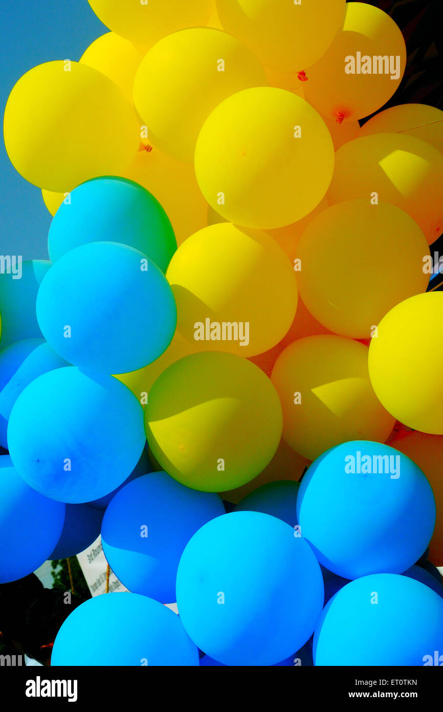 blue balloons, yellow balloons Stock Photo
