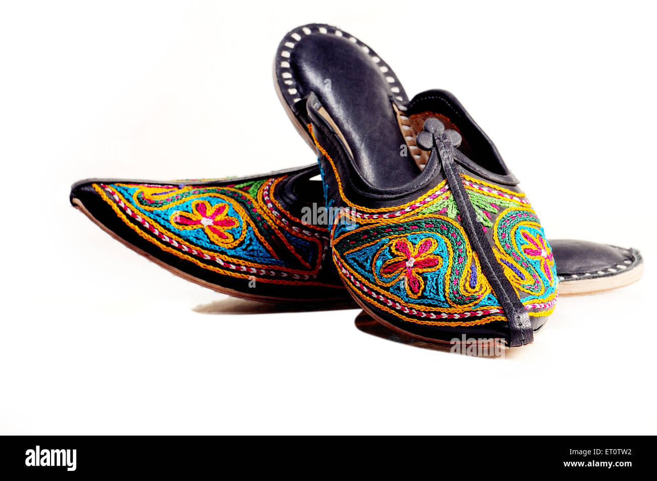 Embroidered leather shoes mojri on white background Stock Photo